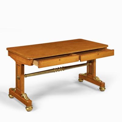 Morel and Seddon A Regency amboyna and gilt library table attributed to Seddon and Morel