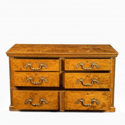 Morel and Seddon A fine George IV burr oak chest of drawers in the manner of Morel and Seddon