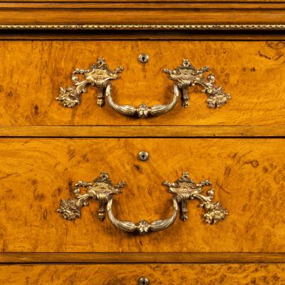 Morel and Seddon A fine George IV burr oak chest of drawers in the manner of Morel and Seddon