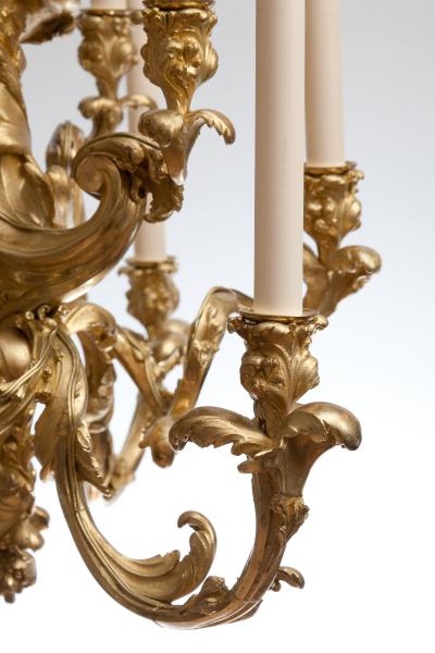 NINE ARM ROCOCO GILT BRONZE FINELY INCISED CHANDELIER