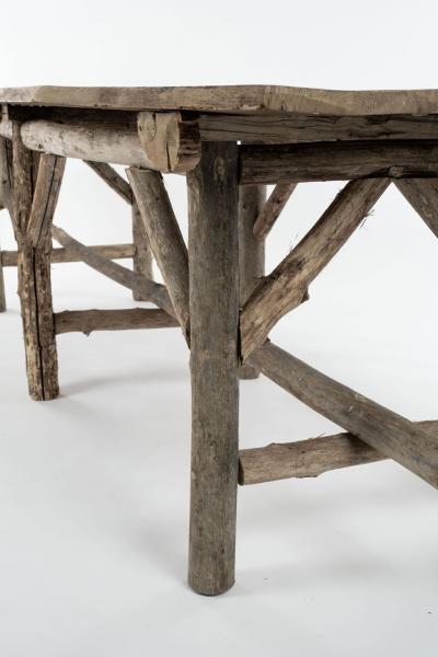 Natural Live Edge Rectangular Shape Table Raised Upon Rustic Wooden Trestle Base