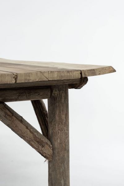 Natural Live Edge Rectangular Shape Table Raised Upon Rustic Wooden Trestle Base