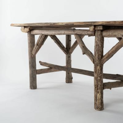 Natural Live Edge Rectangular Shape Table Raised Upon Rustic Wooden Trestle Base