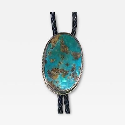 Navajo Dine bolo with large turquoise stone and silver tips