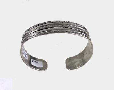 Navajo bracelet with eagles arrows and 2 whirling logs