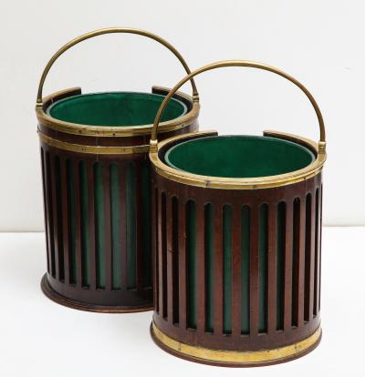 Near pair of brass bound plate buckets 