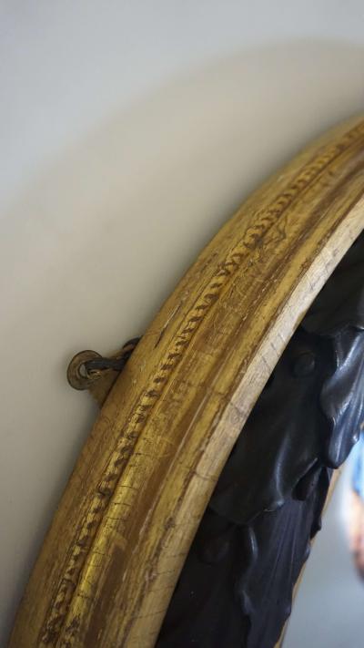 Neoclassical Regency Giltwood and Ebonized Convex Mirror Signed and Dated 1813