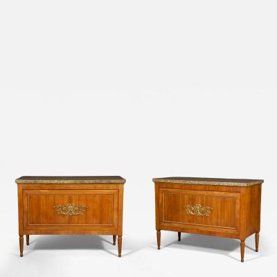 Neoclassical proportioned Lego di Cillegio and gilt wood mounted commodes