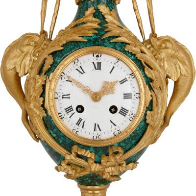 Neoclassical style gilt bronze and malachite mantel clock