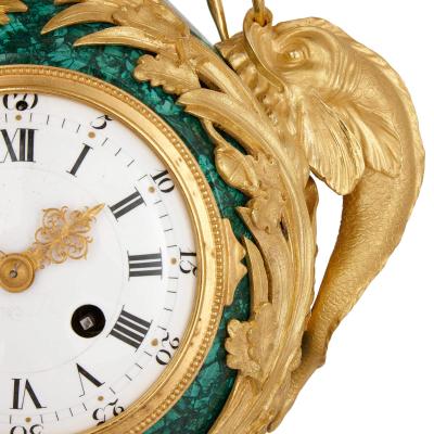 Neoclassical style gilt bronze and malachite mantel clock