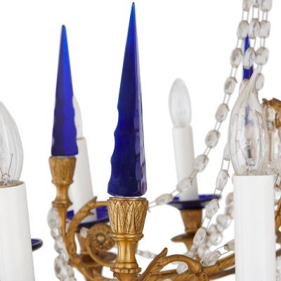 Neoclassical style gilt bronze clear and blue cut glass chandelier