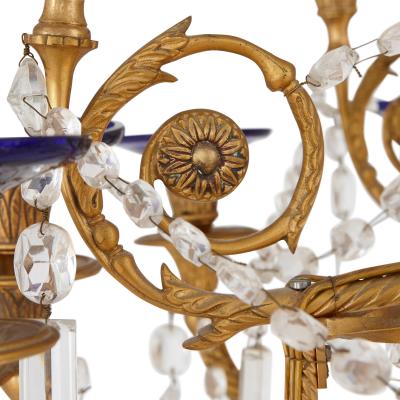 Neoclassical style gilt bronze clear and blue cut glass chandelier