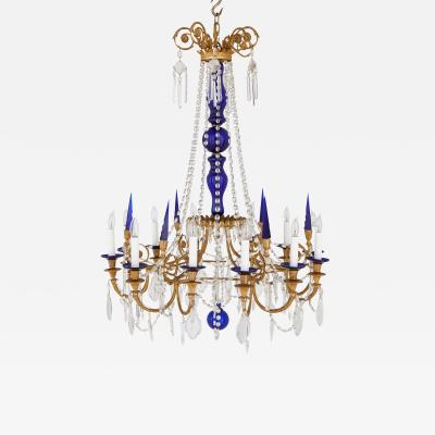 Neoclassical style gilt bronze clear and blue cut glass chandelier