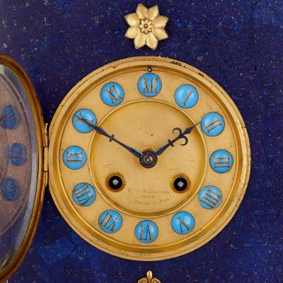 Neoclassical style gilt bronze enamel and lapis lazuli mantel clock