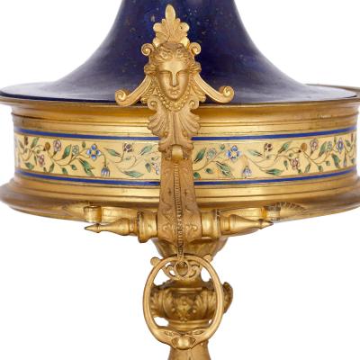 Neoclassical style gilt bronze enamel and lapis lazuli mantel clock