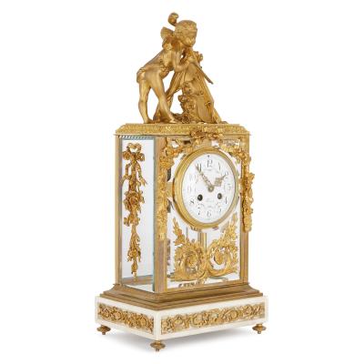 Neoclassical style gilt bronze mounted glass and marble mantel clock