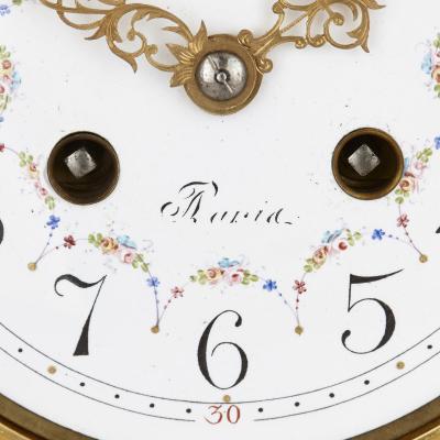 Neoclassical style gilt bronze mounted glass and marble mantel clock