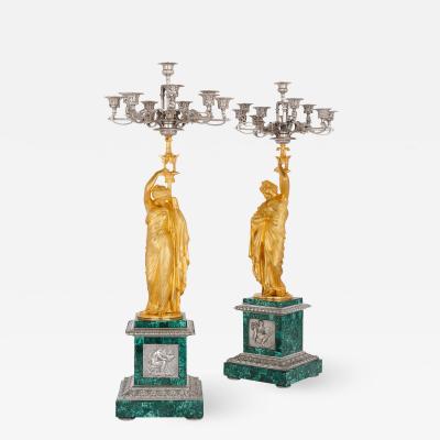 Neoclassical style malachite silvered and gilt bronze clock set