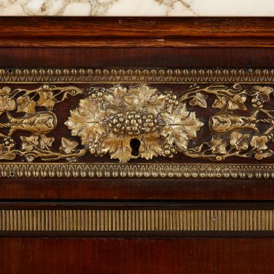 Neoclassical style marble and ormolu mounted wood commode after Leleu