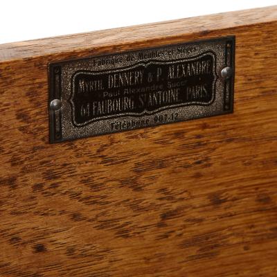 Neoclassical style marble and ormolu mounted wood commode after Leleu