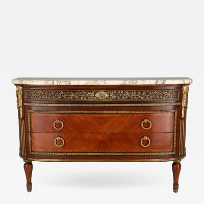 Neoclassical style marble and ormolu mounted wood commode after Leleu