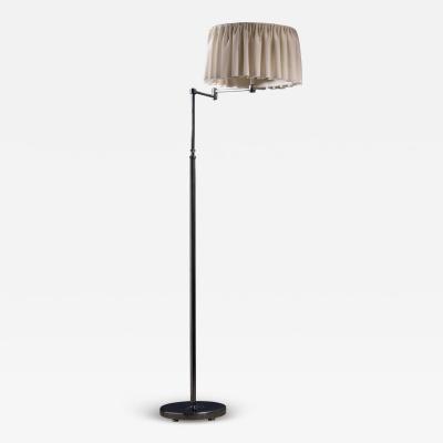 Nickel plated adjustable floor lamp