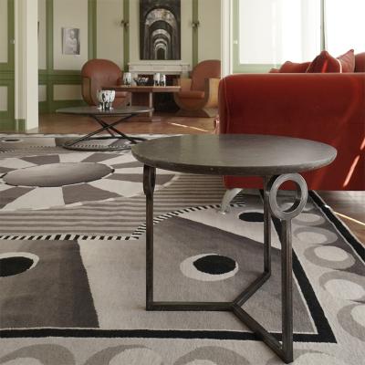 Nicolas Aubagnac ULYSSE GUERIDON Forged steel and Hainaut stone side table