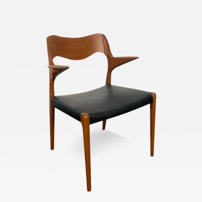 Niels Otto M ller Niels Otto M ller 55 arm chair in teak with new black leather seat