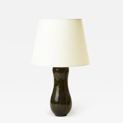 Nils Thorsson Table lamp with intaglio jungle pattern by Nils Thorsson