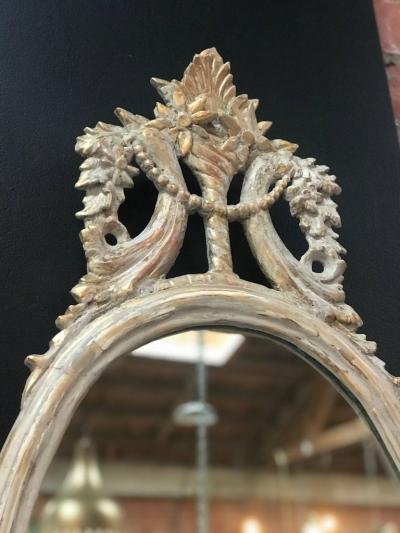 Northern European Oval Carved Wood Mirror with White Frame early 19th century
