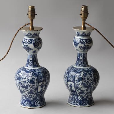 OCTAGONAL DUTCH DELFT BLUE AND WHITE WAISTED BOTTLE VASES CONVERTED TO LAMPS