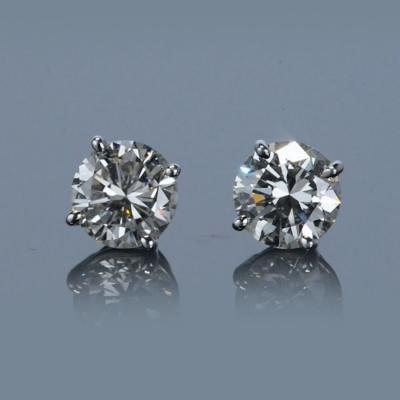 ONE PAIR OF ROUND DIAMOND EAR STUDS