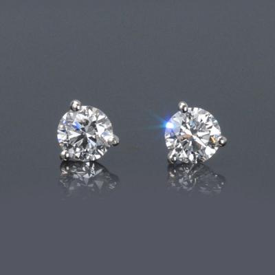 ONE PAIR OF ROUND DIAMOND EAR STUDS
