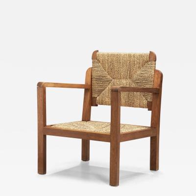 Oak and Woven Straw Armchair France ca 1960s