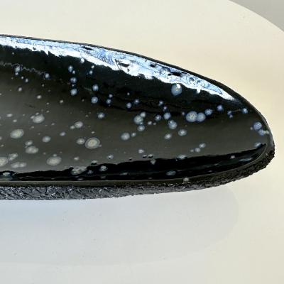 Oblong centerpiece with deep blue speckled glaze