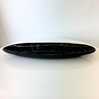 Oblong centerpiece with deep blue speckled glaze