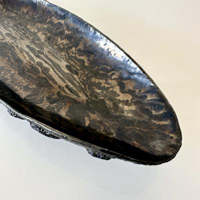 Oblong centerpiece with ring patterned underside in gold and silver glaze