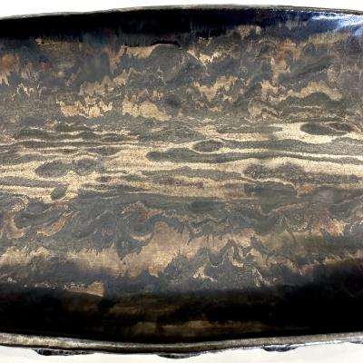 Oblong centerpiece with ring patterned underside in gold and silver glaze