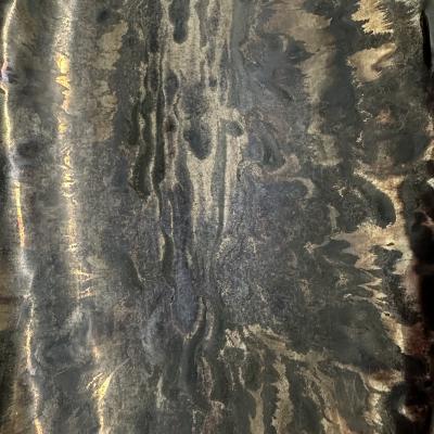 Oblong centerpiece with ring patterned underside in gold and silver glaze