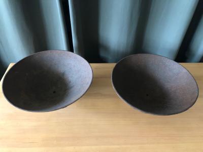 Olof Hult A pair of cast iron urns Mikrokosmos designed by Olof Hult
