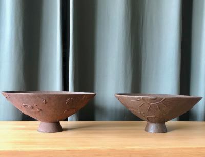 Olof Hult A pair of cast iron urns Mikrokosmos designed by Olof Hult