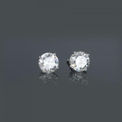 One Pair of Round Diamond Ear Studs 1 52 carat cttw containing 1 54 carat H VS2