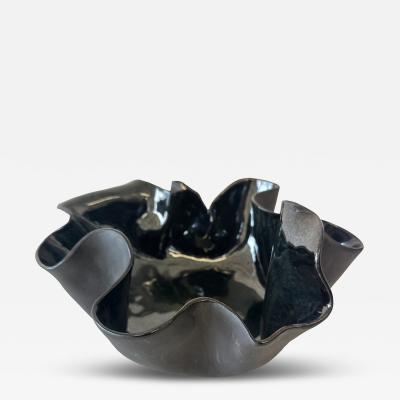 Organic ruffled edge bowl in deep blue black gloss finish 