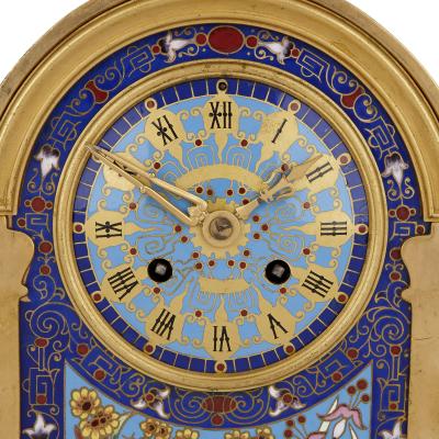 Oriental style gilt bronze and champlev enamel clock set