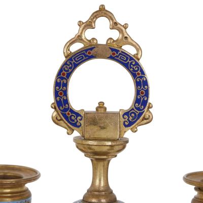 Oriental style gilt bronze and champlev enamel clock set