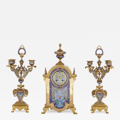 Oriental style gilt bronze and champlev enamel clock set