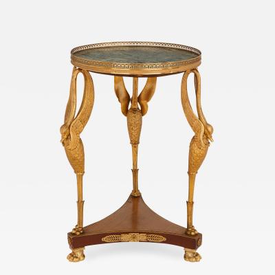 Ormolu and marble round side table in the French Empire style