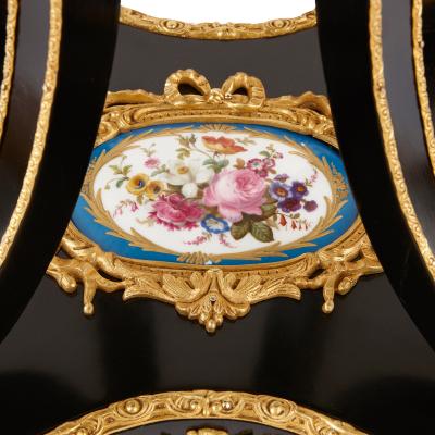 Ormolu mounted S vres porcelain and ebonised wood side table