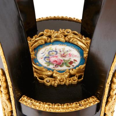 Ormolu mounted S vres porcelain and ebonised wood side table