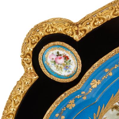Ormolu mounted S vres porcelain and ebonised wood side table